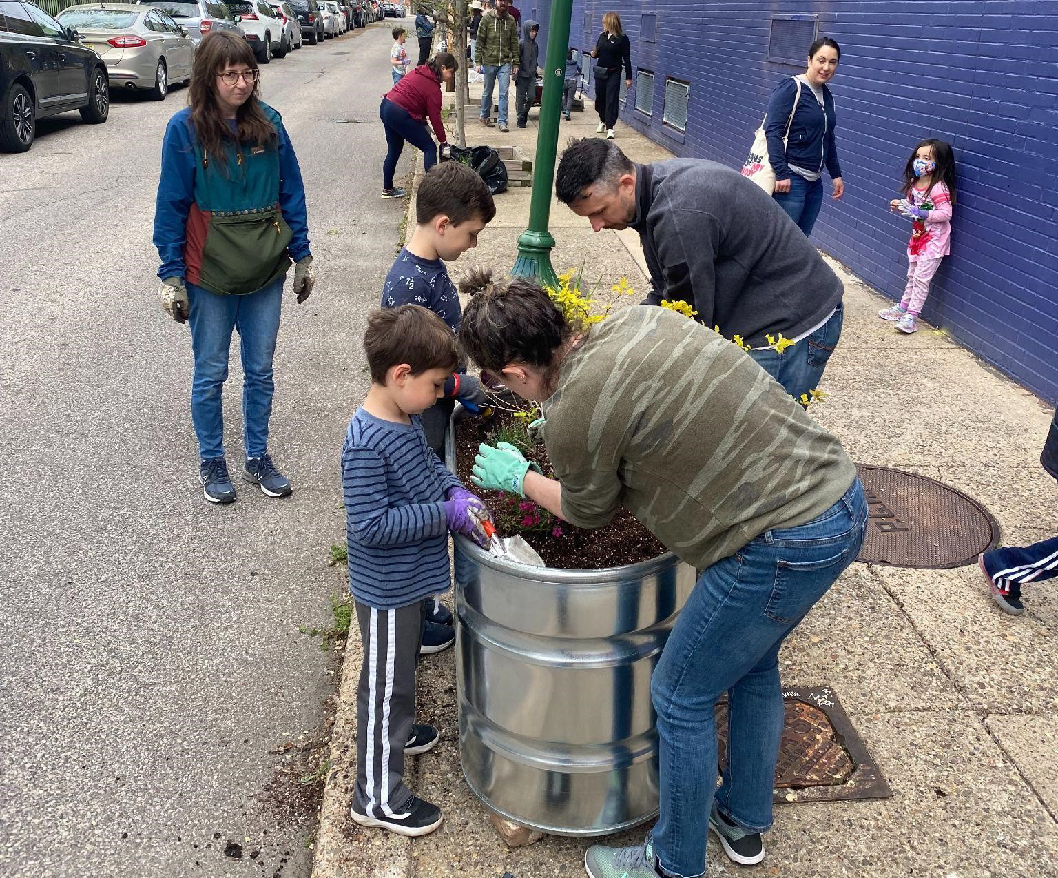 Planters, funded by Feet First Philly, were installed to block illegal parking and filled with native plants.